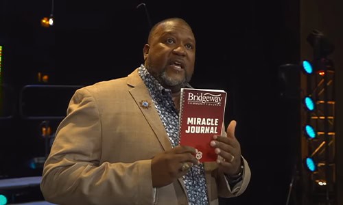 YouTube clip of Dr. David Anderson holding Bridgeway Community Church G3 journals