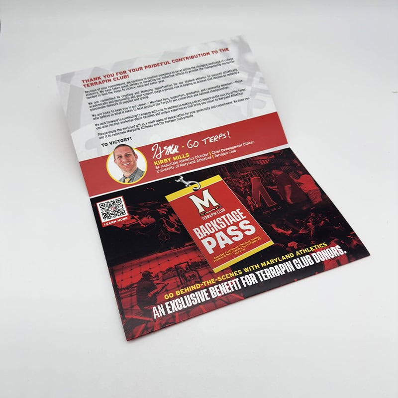 University of Maryland Membership self mailer unfolds to reveal branded luggage tag inside by Strategic Factory.