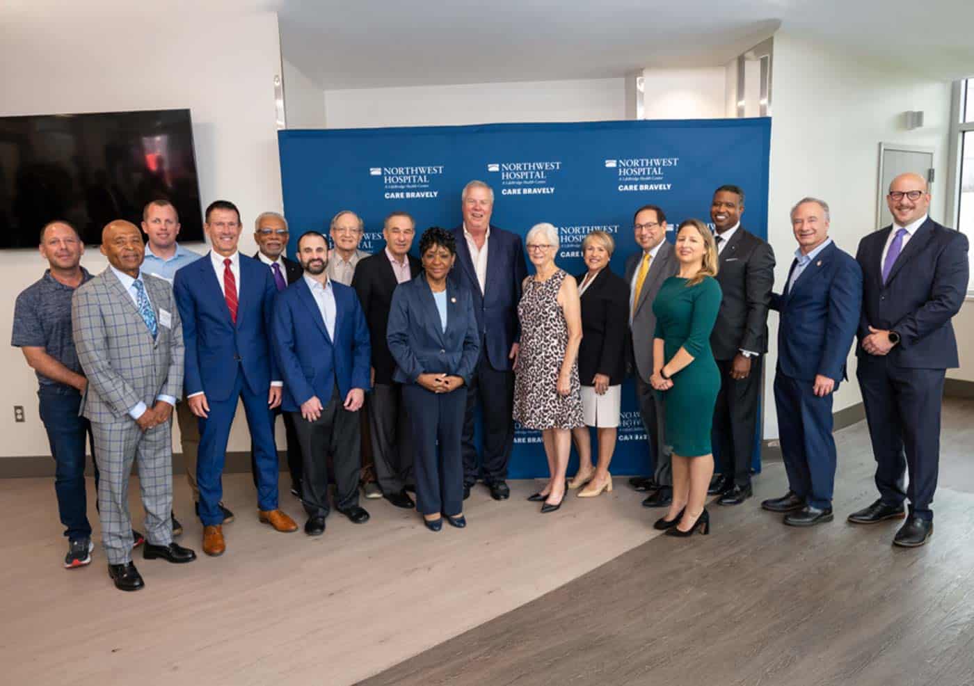 Keith Miller, Craig Carmical, and the Northwest Hospital Board members pose for ribbon cutting of new emergency room